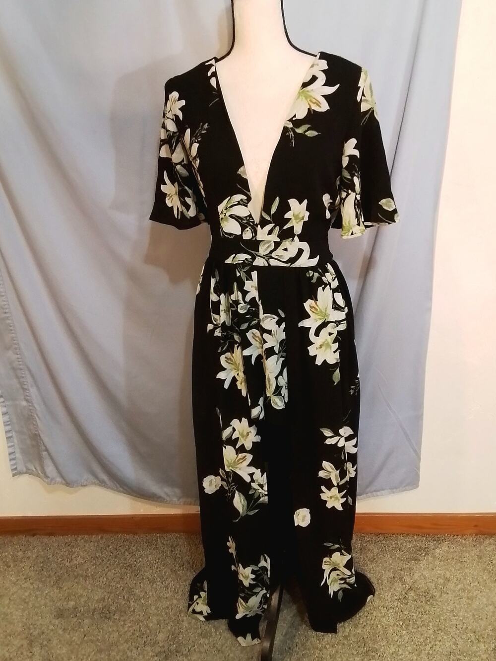 Socialite. Black and floral romper with open maxi skirt